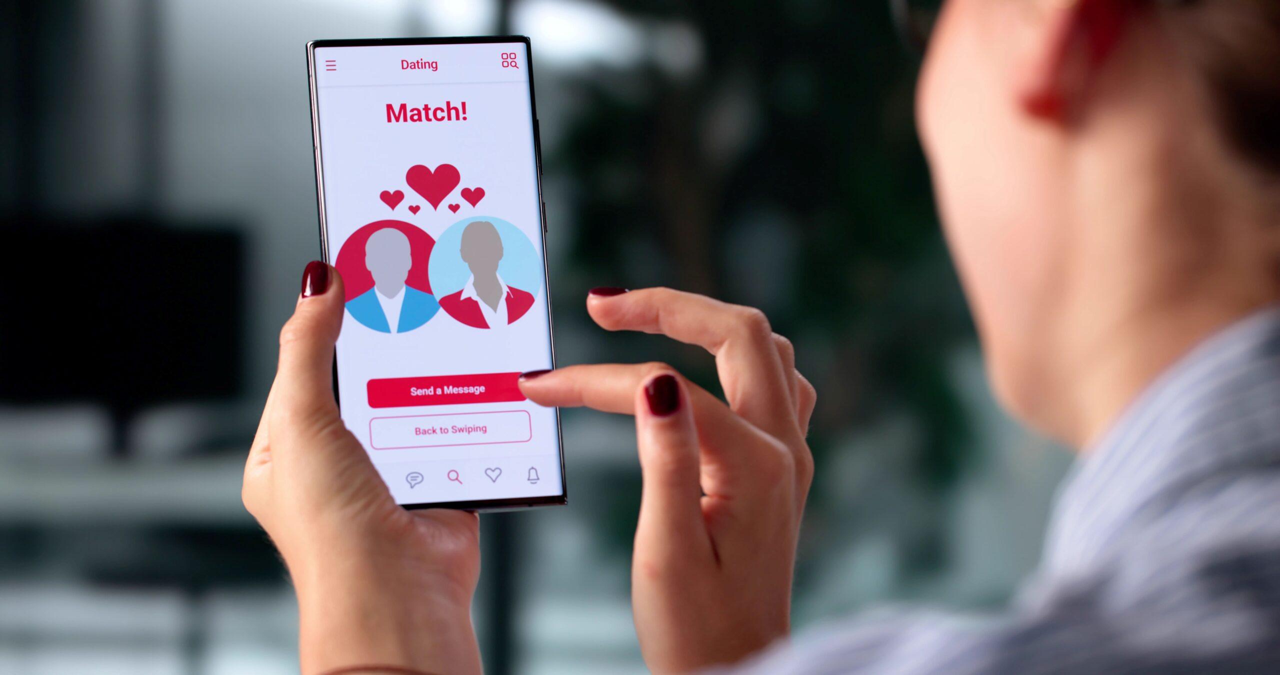 Woman Using Online Dating App On Smartphone Possibly Falling For Scam